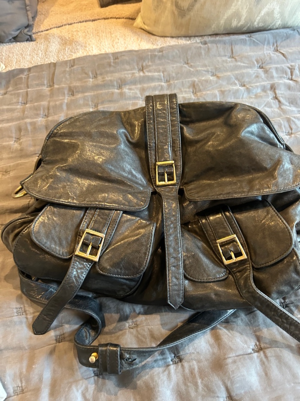 BULGA Black Leather Crossbody Backpack with Gold Buckles